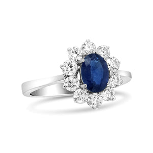18K White Gold 7x5 mm Oval Cut Blue Sapphire and Round Diamond 3/4 Cttw Sunburst Halo Ring (F - G Color, VS1 - VS2 Clarity) - Rieworkes